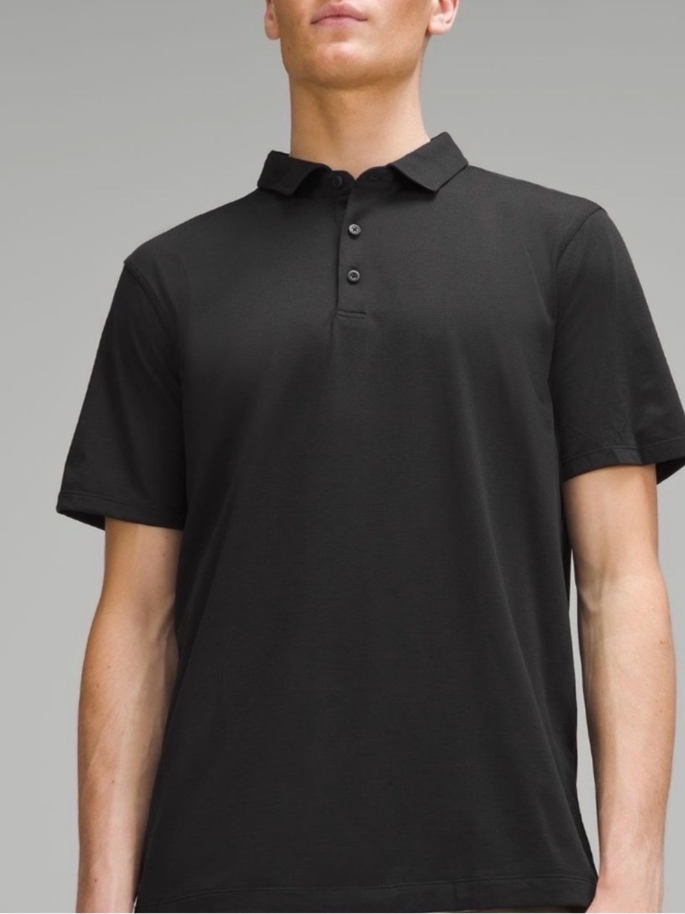 Men's lululemon Evolution Black heather Polo Shirt. Size M. Great condition.